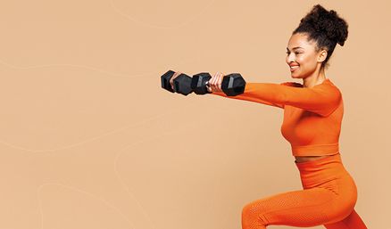 Woman using dumbbells