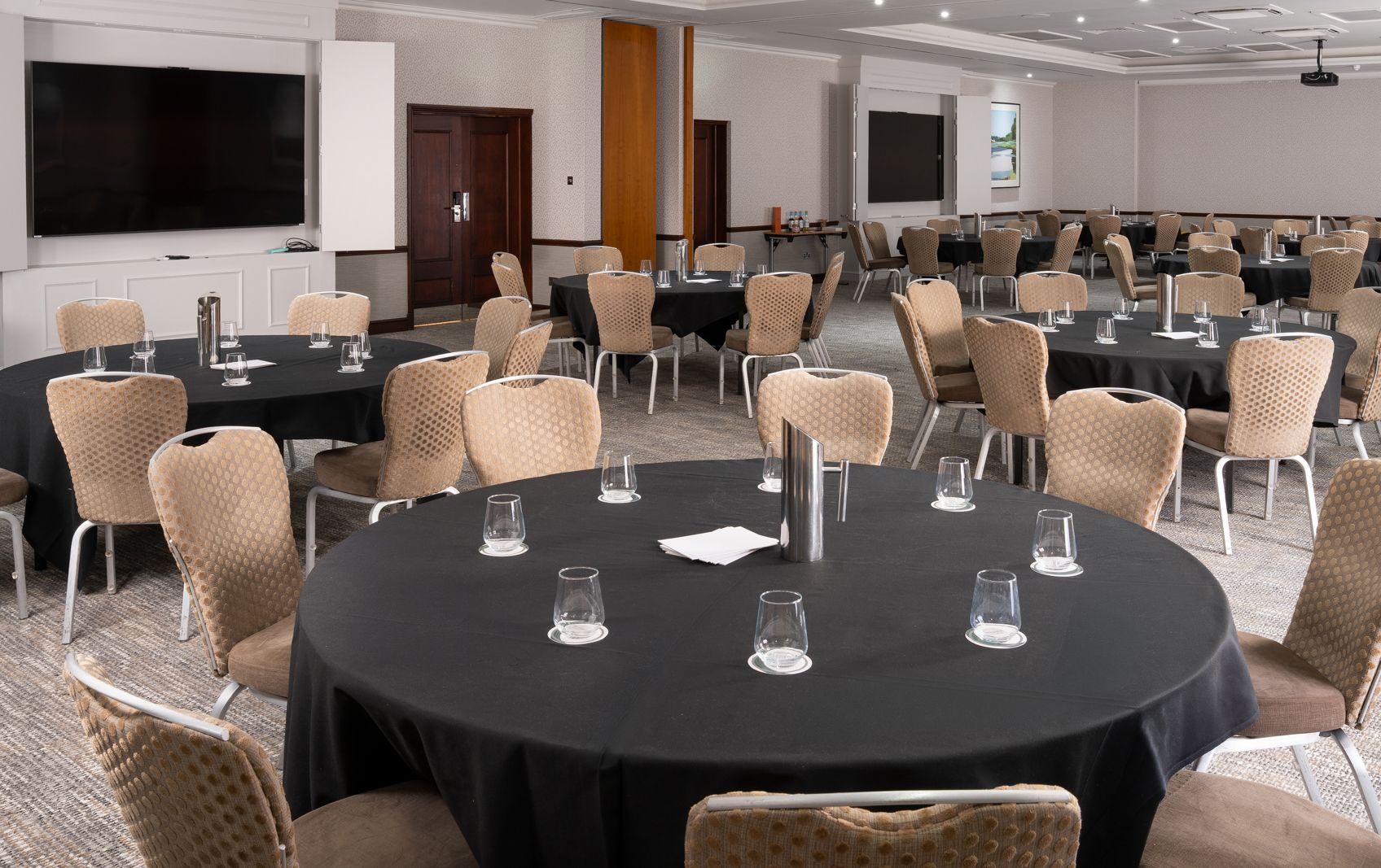 Hambledon Suite cabaret style black table clothes wide view