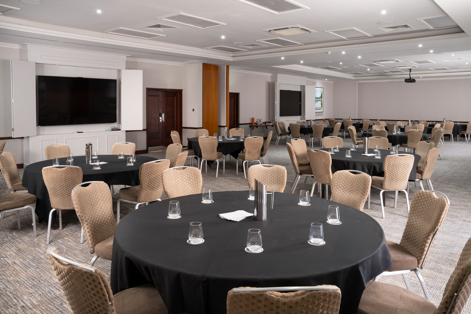 Hambledon Suite cabaret style black table clothes wide view